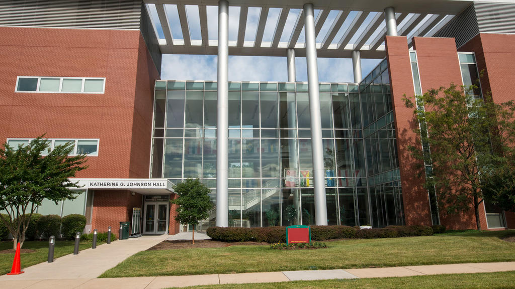 Katherine G. Johnson Hall on Mason's SciTech campus has long, steel columns, a brick structure, and glass windows.