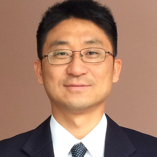 Kun Sun wears a dark suit, tie, and glasses in his faculty profile for the IST department at George Mason University.