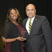 Shawn Purvis, MS, IT '99 (on left) accepts award from Christopher M. Preston, Sr., BS' 96. (Courtesy photo)