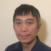 Anh Phan Nguyen, IST PhD student at Mason, wears a navy-blue collared shirt in his profile. 