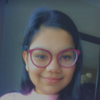 Anuridhi Gupta, IST PhD student at Mason, wears a pink sweater and pink glasses in her profile.