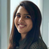 Hiba Siraj, IST PhD student at Mason, wears a gray, polka dot collared shirt in her profile.