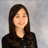 Julia Hsin-Ping Hsu, IST PhD students, wears a black, flowered cardigan in her profile