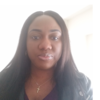 Olutola Adebiyi, IST PhD student at Mason, wears a dark jacket and purple shirt in her profile.