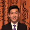 Steven Sun, IST PhD student at Mason, wears a black suit and blue tie in his profile.