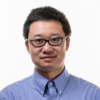 Xiaonan Guo wears a light-blue, collared shirt for his faculty profile in the IST department at George Mason University.